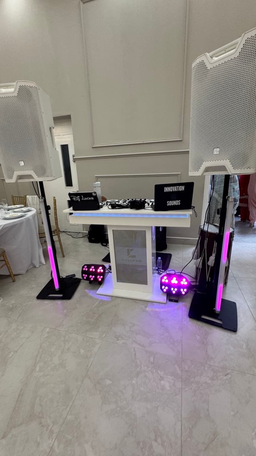 Innovation Sounds setup beside colourful wedding decor